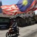 Warga Malaysia dilarang mudik Lebaran tahun ini untuk mencegah penyebaran Covid-19. FOTO: Reuters