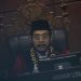Ketua Mahkamah Konstitusi Anwar Usman membantah isu bahwa MK sudah memiliki keputusan atas gugatan sistem pemilu. (ANTARA FOTO/SIGID KURNIAWAN via CNN INDONESIA)