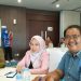 Hendra Ambarita, bersama Hartati, Dalam sebuah kesempatan Sosialisasi Ketenagakerjaan di Jambi. (Ist)